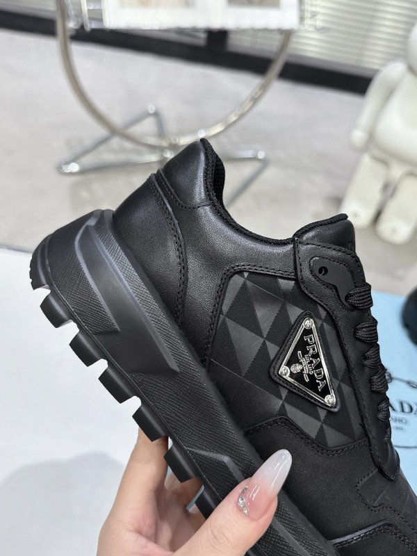 2025 Unisex Prada Black Leather Sneakers KFY00310